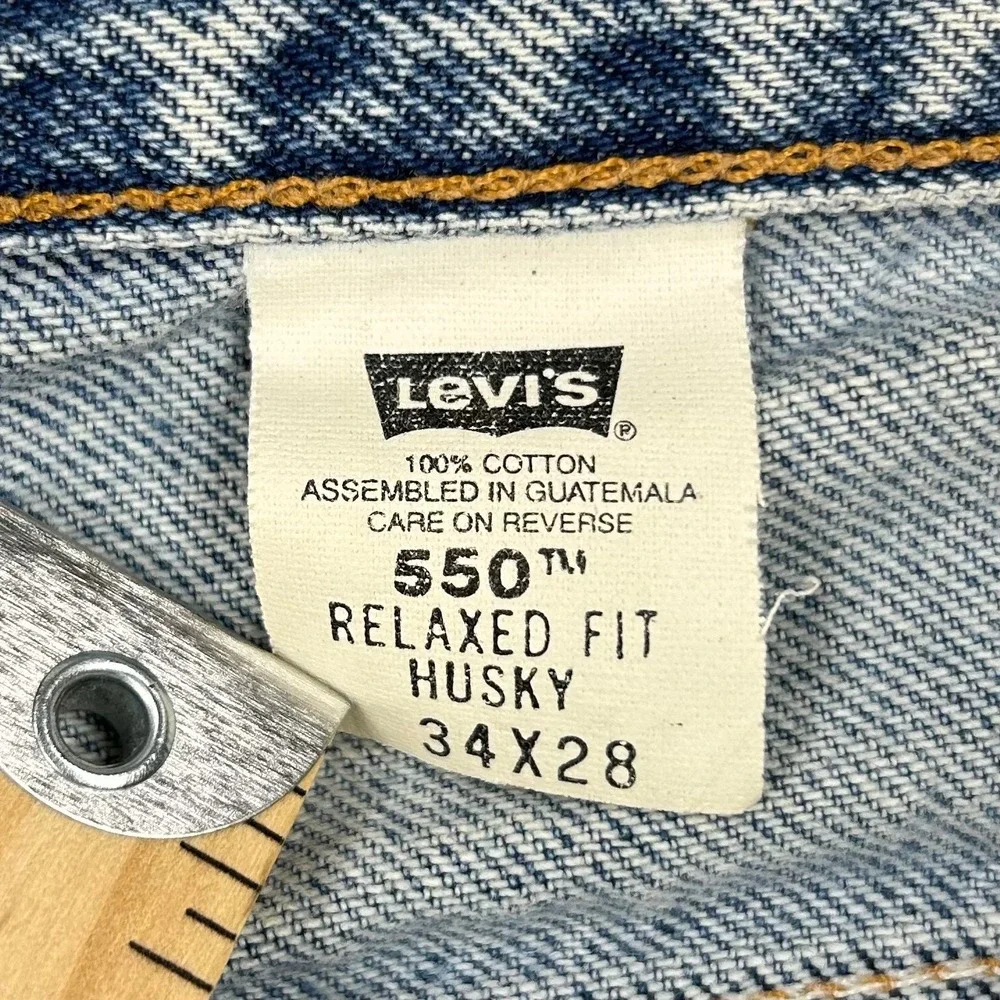 Vintage Levis 550 Relaxed Fit Husky Jeans Mens Size 34x28 Light Wash Denim Pants